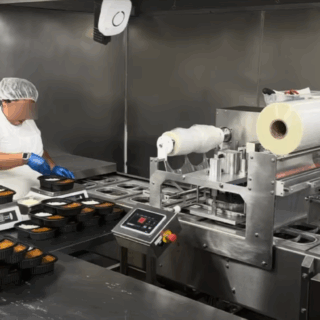 Discover the versatility of our Die Cut Tray Sealer, complete with a scrap take-up system for streamlined packaging. This machine is ideal for hand-loaded applications, ensuring precise seals with minimal waste. Perfect for food producers looking to boost efficiency and maintain product integrity.
