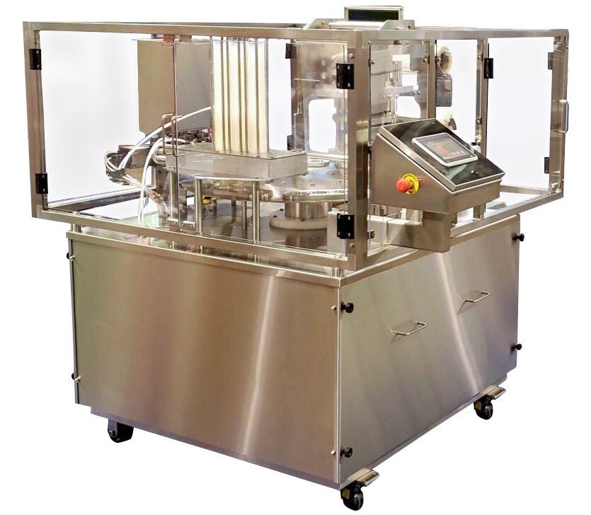 Photo of the RM-36x3 rotary filler and sealer packaging machine made by Rocket Machine Works in Fresno, CA.
